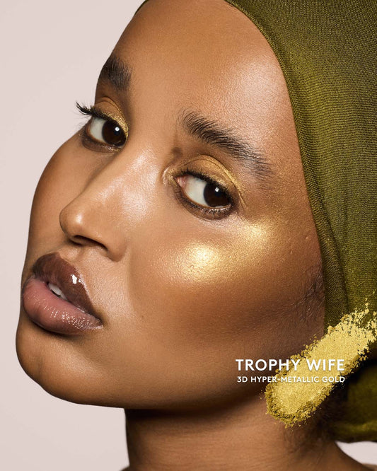 medium skin toned model wearing killawatt freestyle highlighter in shade trophy wife