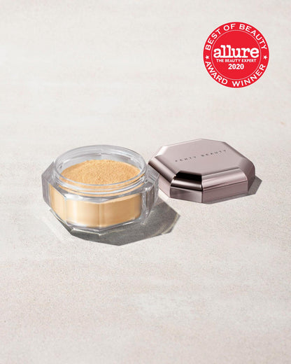 an open jar of mini setting powder, with the lid to one side, laid against a gray background and the Allure "Best of Beauty" award stamp overimposed