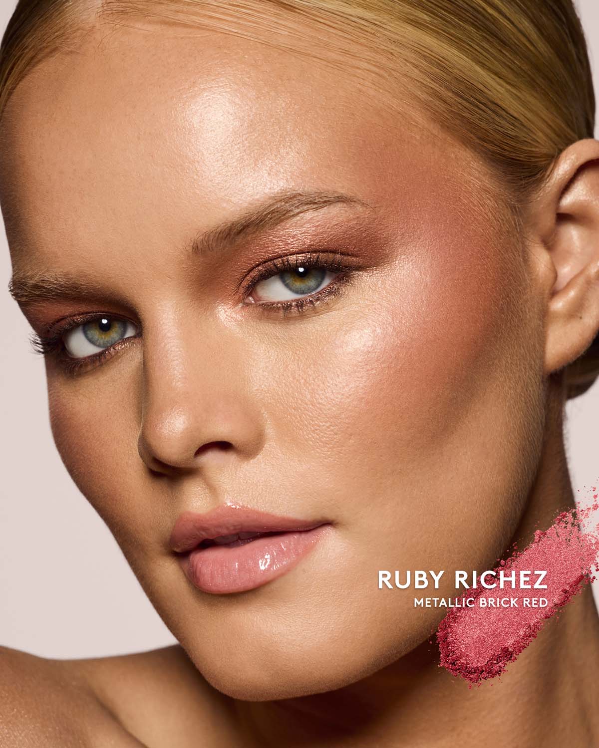 light skin toned model wearing killawatt freestyle highlighter in shade ruby richez