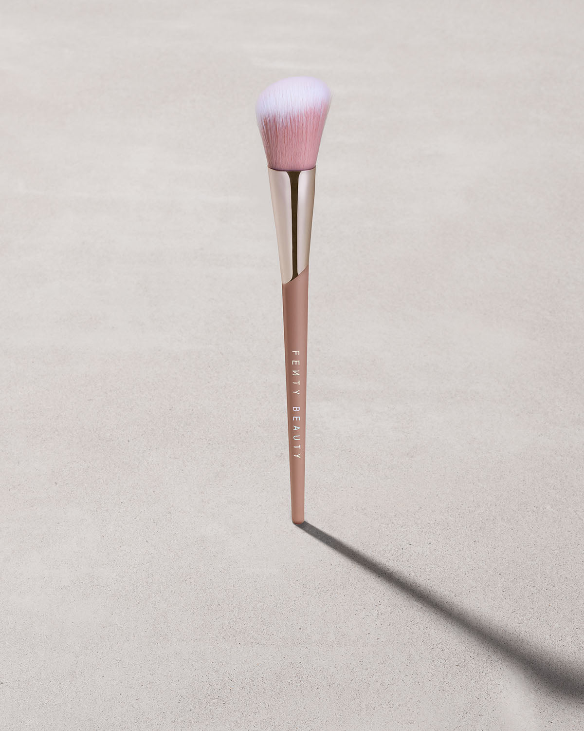 Blush brush 155 on a concrete background.