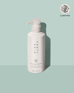 clear thinker clarifying shampoo on a light blue background